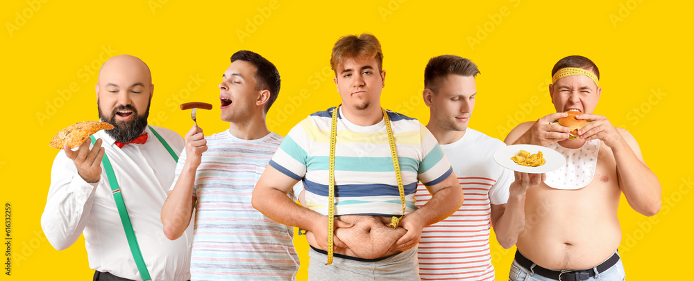 Upset young overweight man with measuring tape on yellow background