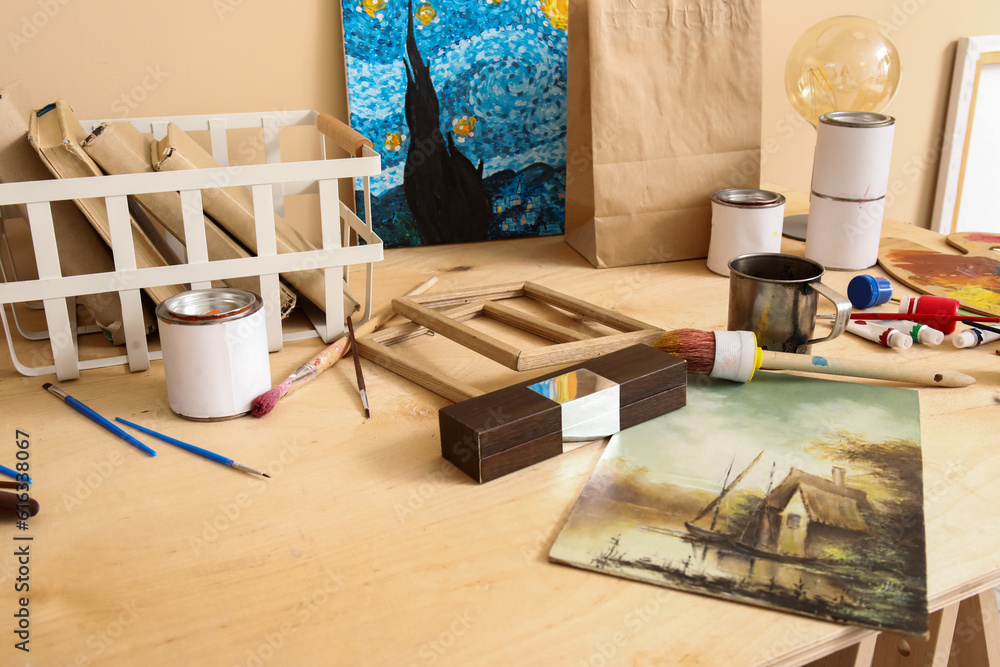 Table with artists supplies in studio