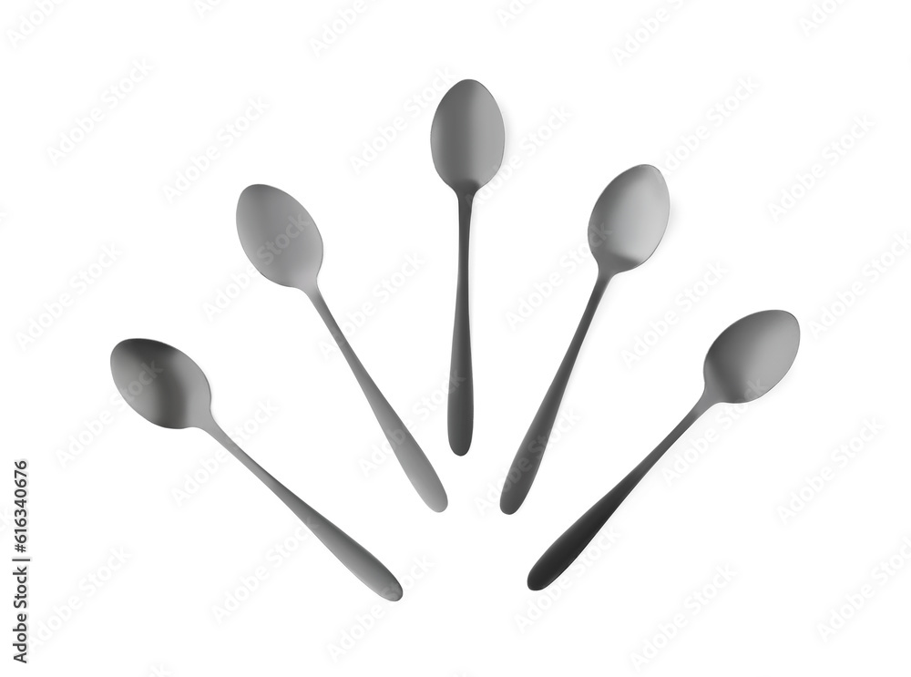 Stainless steel spoons on white background