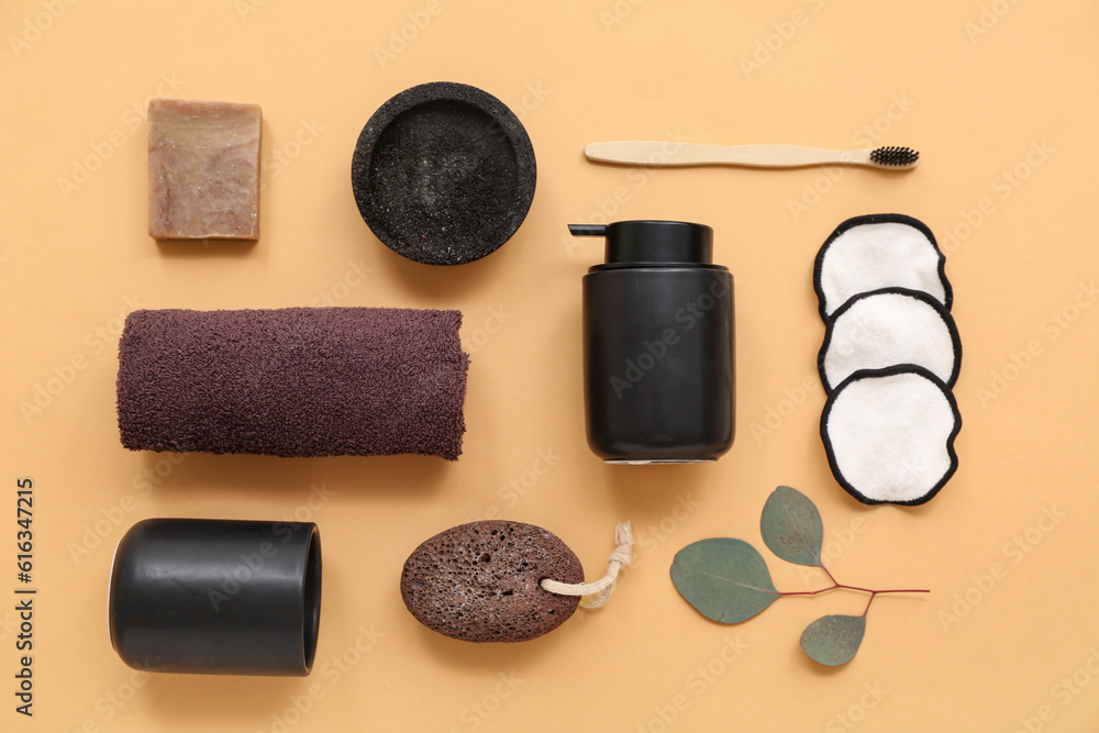 Composition with different bath accessories and eucalyptus branch on color background