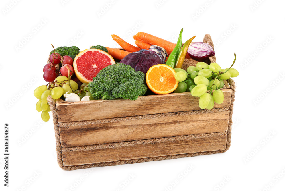 Wooden box with different fresh fruits and vegetables on white background