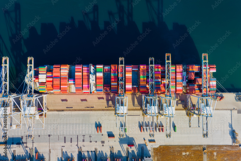 Cargo commercial port. View from a drone. Containers for transporting goods. Cargo sea transport. Vi