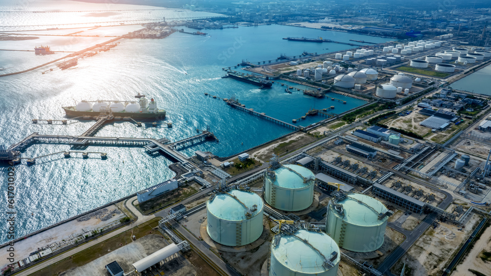 LNG (Liquified Natural Gas) tanker anchored in Gas terminal gas tanks for storage. Oil Crude Gas Tan