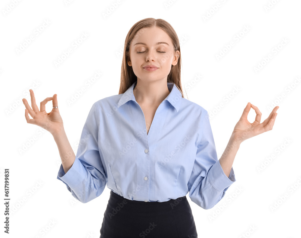 Young businesswoman meditating on white background. Balance concept