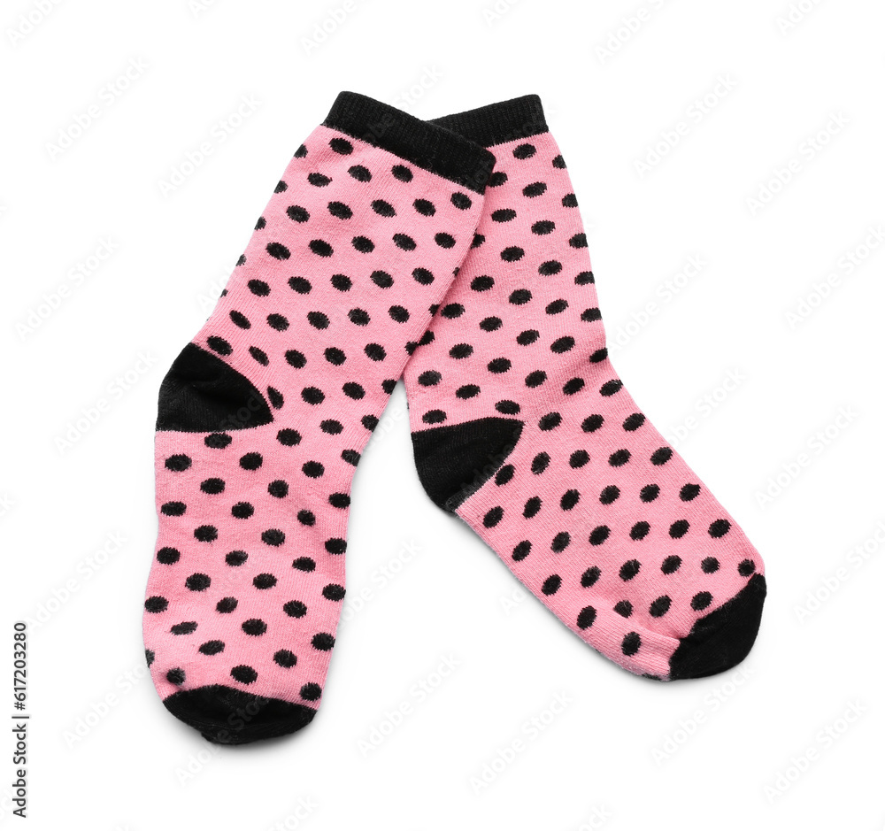 Pair of pink cotton socks on white background