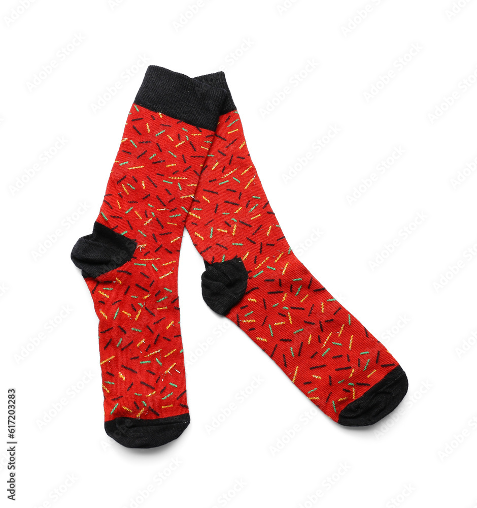 Pair of red socks on white background