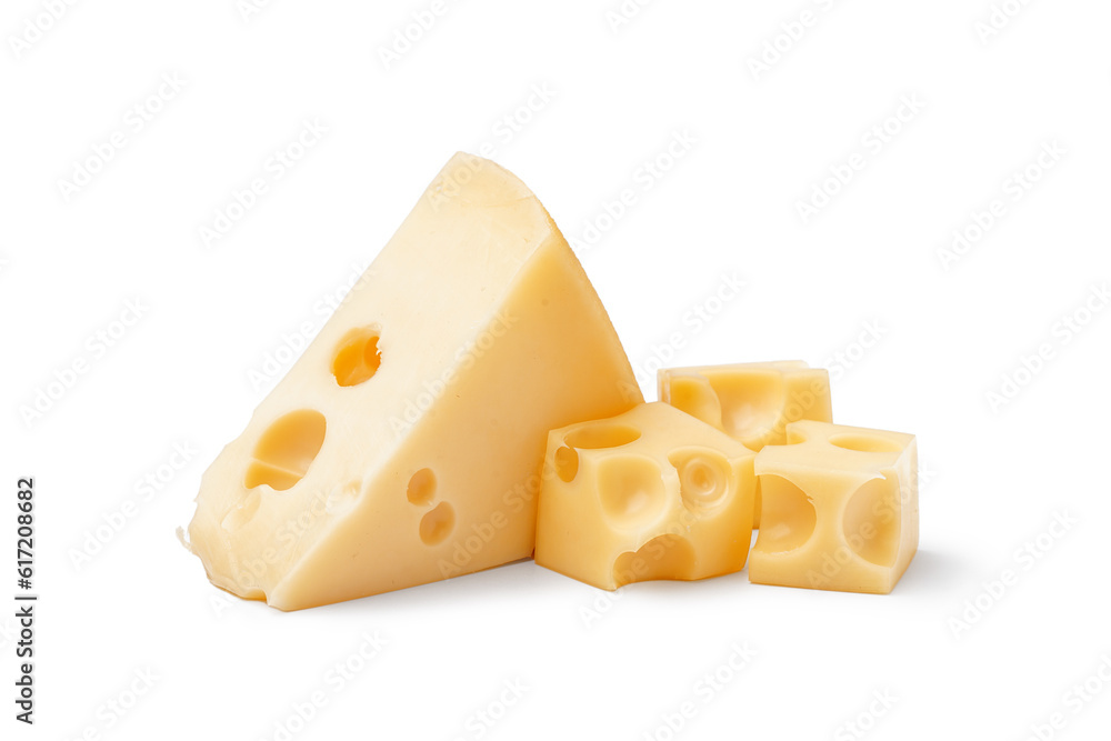 Piece and cubes of Swiss cheese on white background