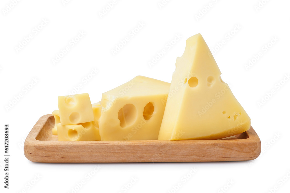 Pieces and cubes of Swiss cheese with wooden tray on white background