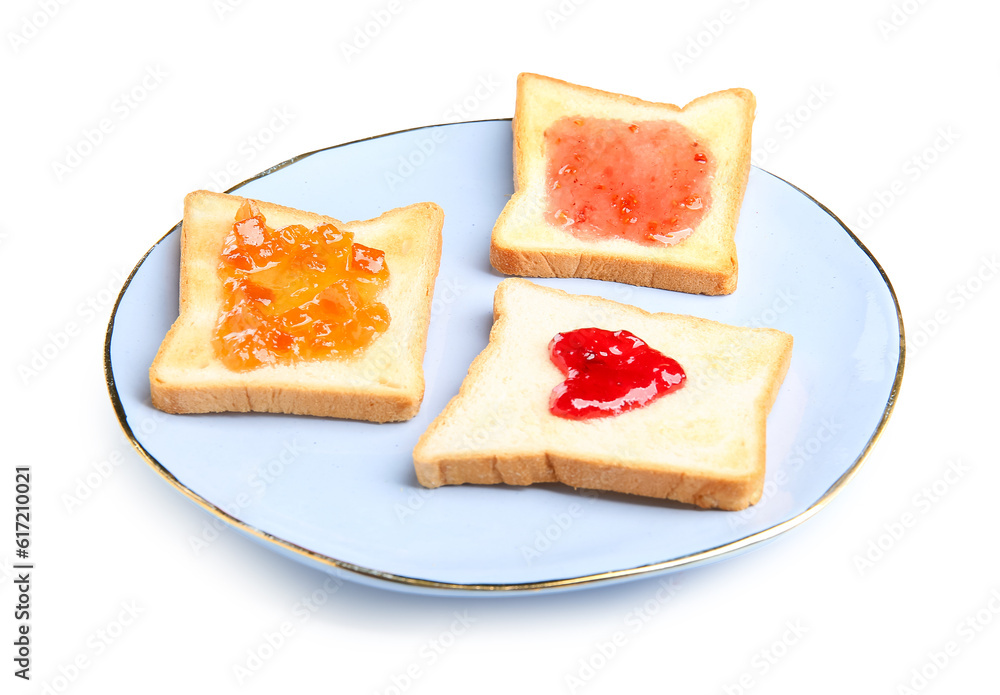 Plate of toasts with delicious jam on white background