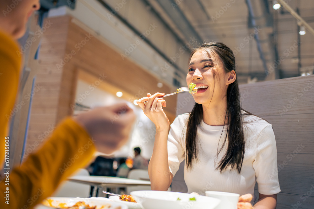 Asian beautiful women having dinner with friend in restaurant together. 