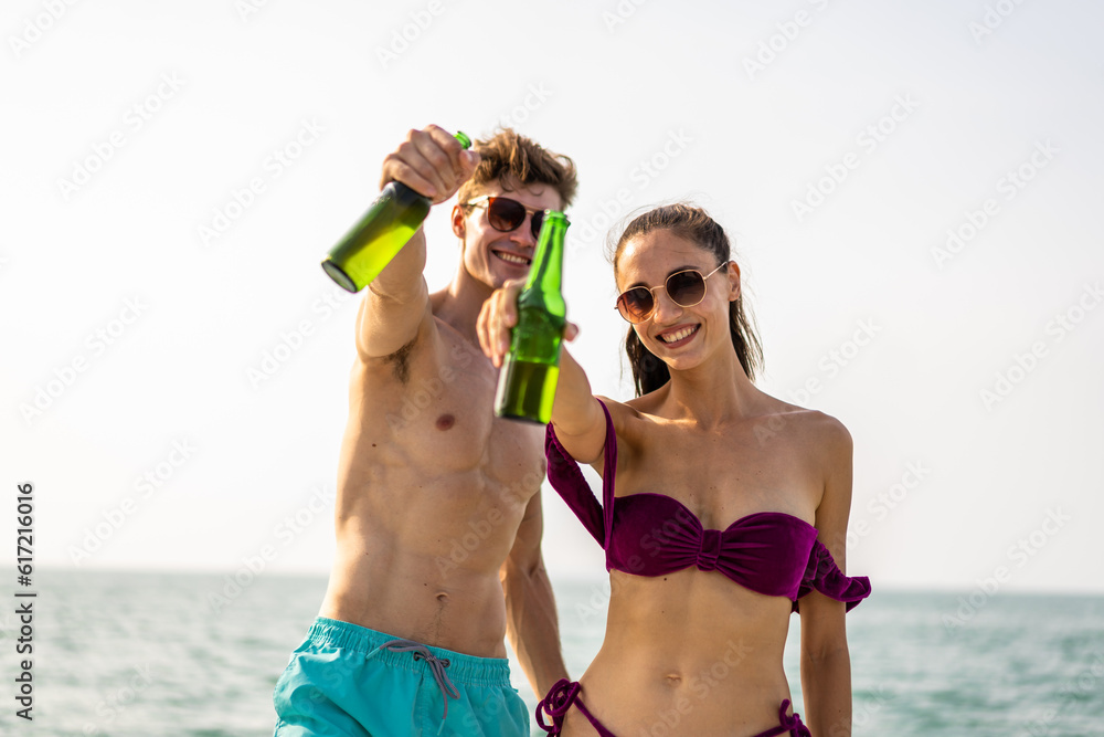 Portrait of Caucasian romantic couple look at camera during yachting. 