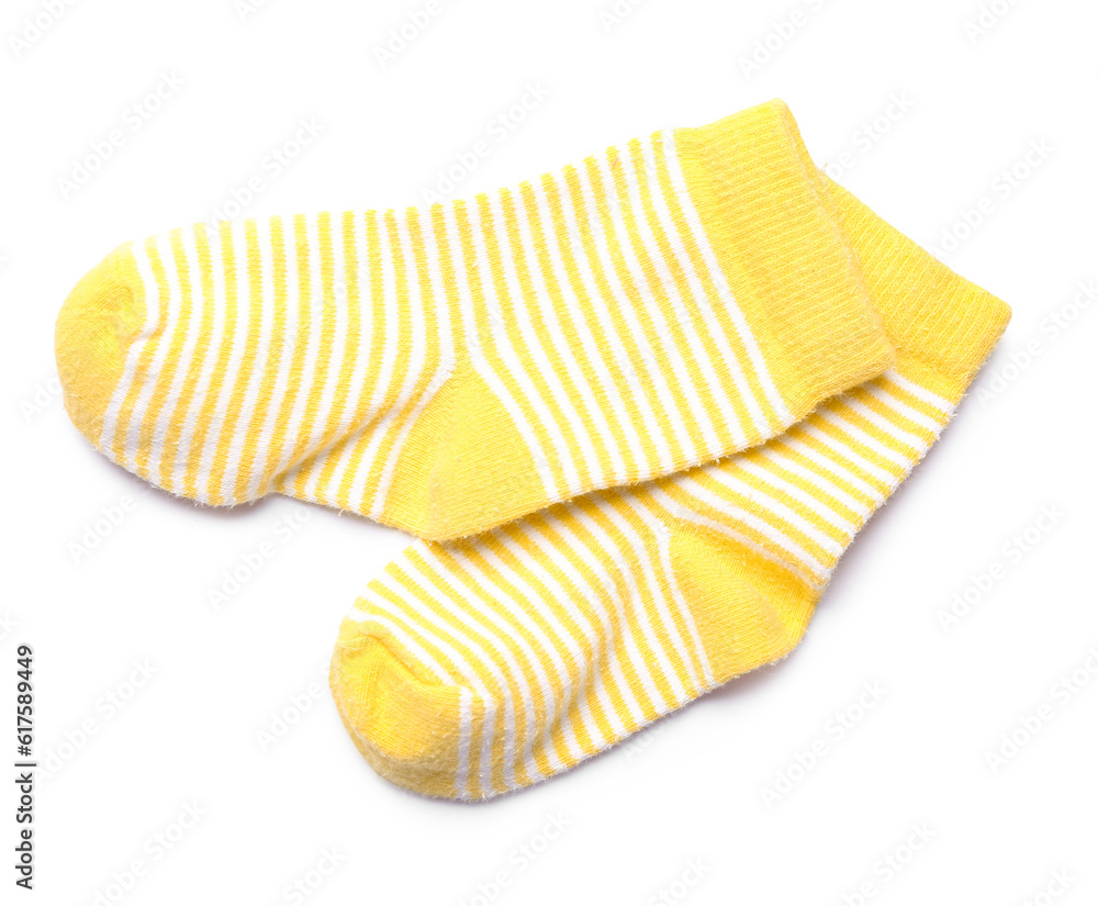 Pair of yellow baby socks isolated on white background