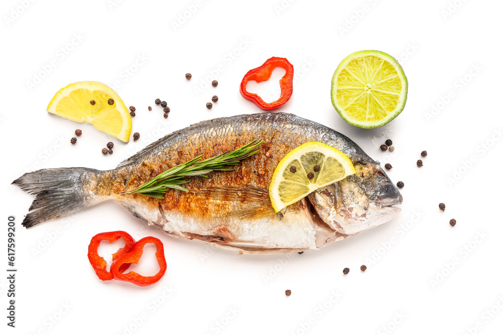 Tasty grilled dorado fish with lemon on white background