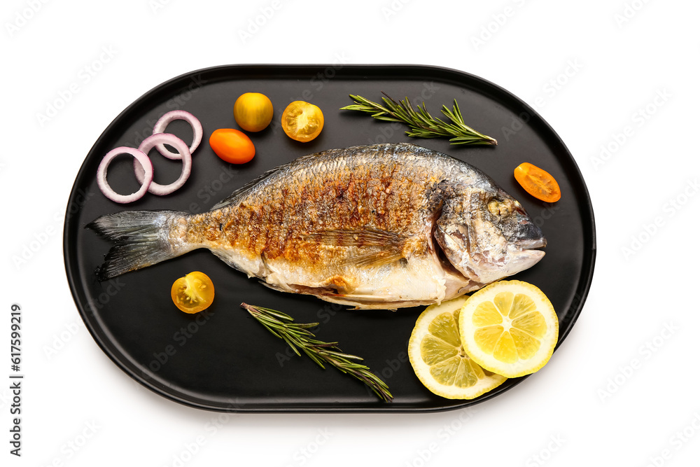 Tray with tasty grilled dorado fish on white background