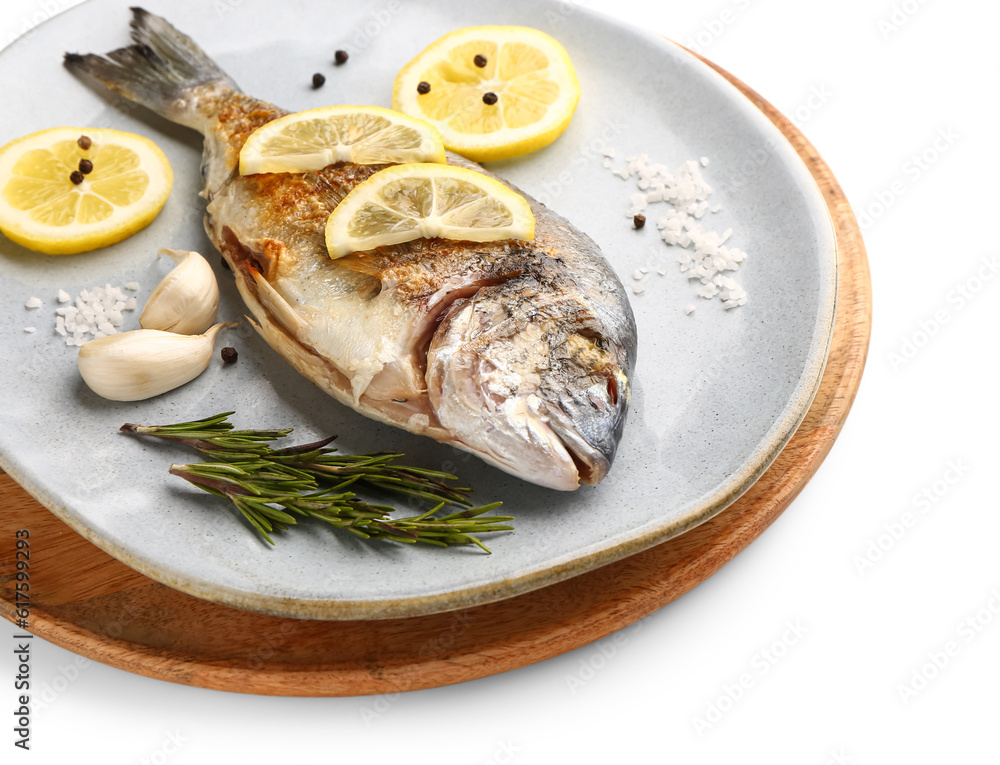 Plate with tasty grilled dorado fish on white background