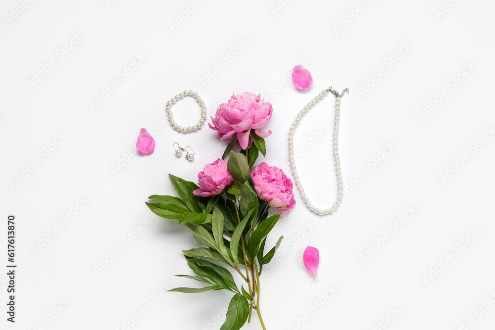 Composition with stylish female accessories and beautiful peony flowers isolated on white background