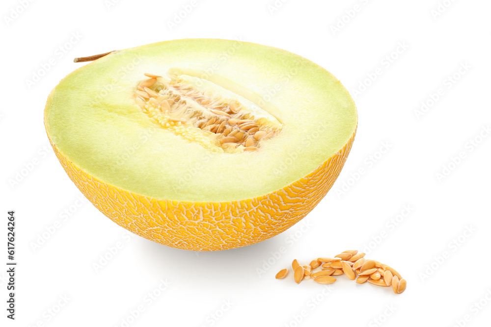 Half of sweet melon and seeds on white background