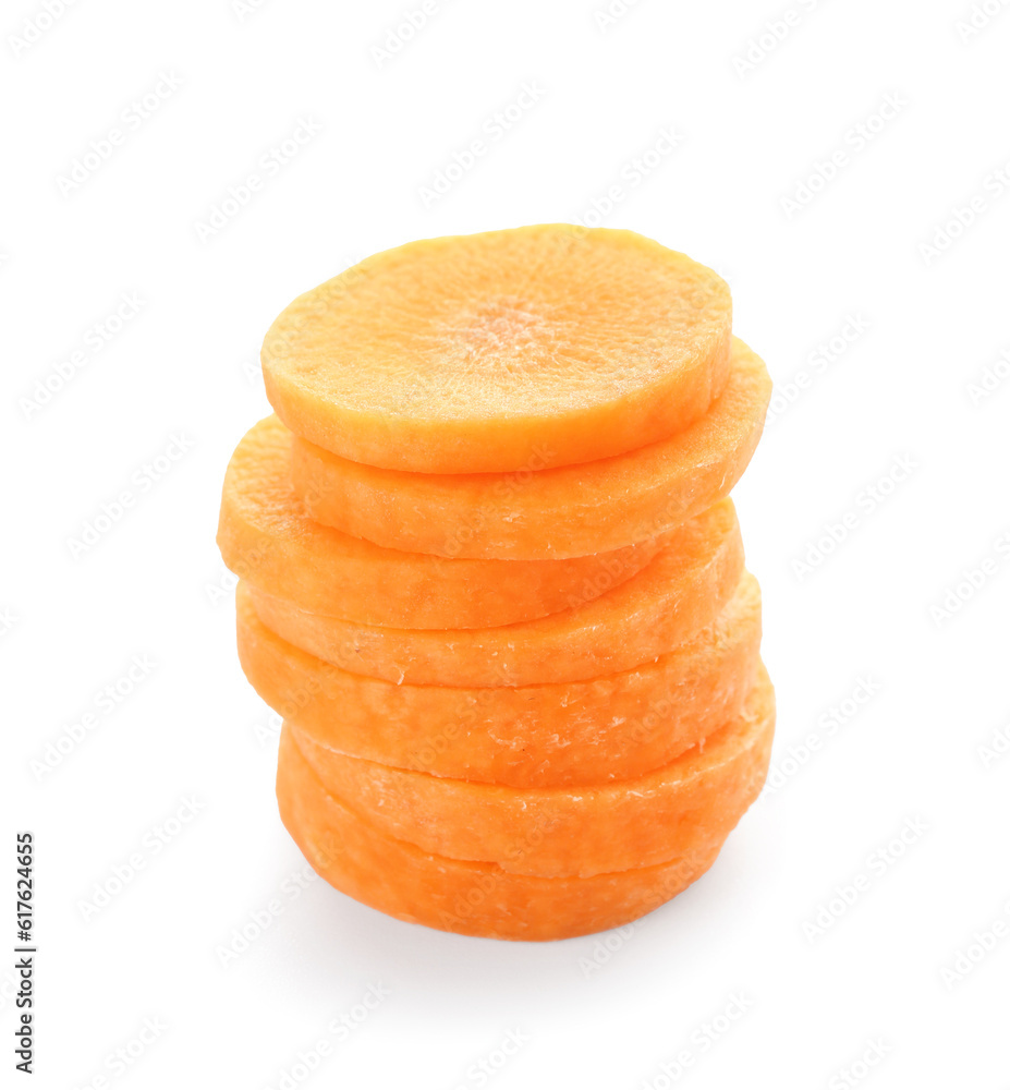 Slices of fresh carrots on white background