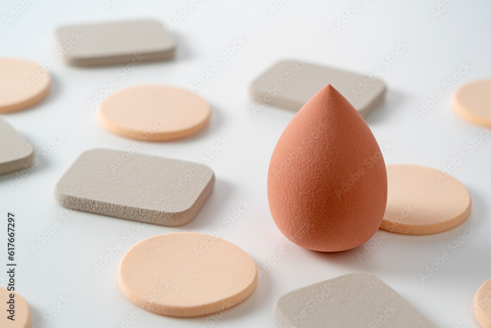 Makeup sponge placed on a white background.