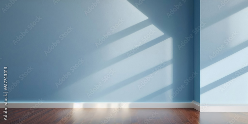 Blue empty wall and wooden floor with interesting with shadow from the window. Interior background f