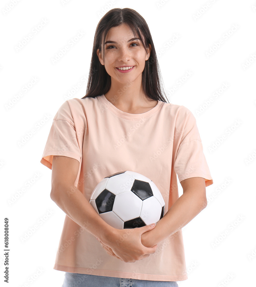 Young woman with soccer ball on white background