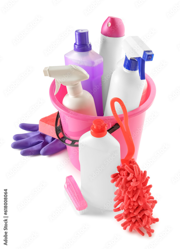 Bucket with different cleaning supplies on white background