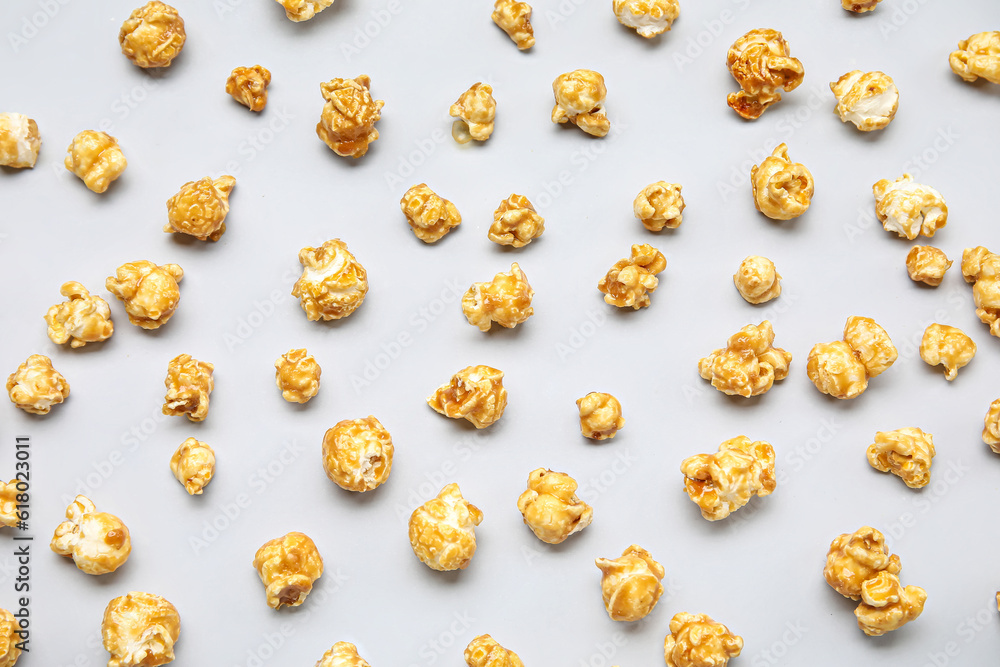 Tasty popcorn on grey background