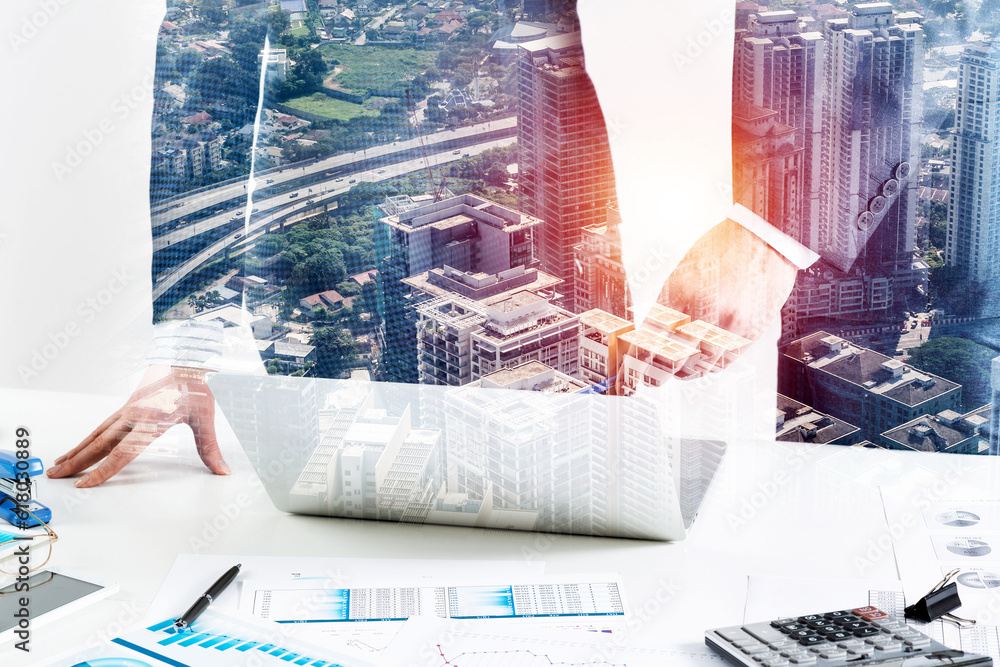 Businesspersons stand near office desk