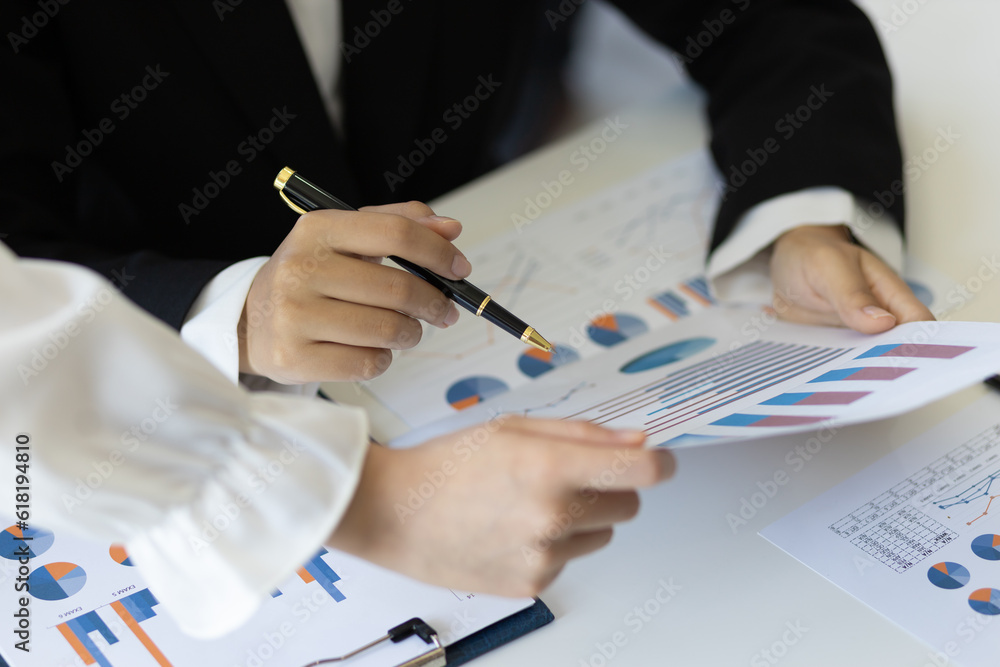 Businesswoman meeting financial advisor discuss business growth chart analysis in financial report a