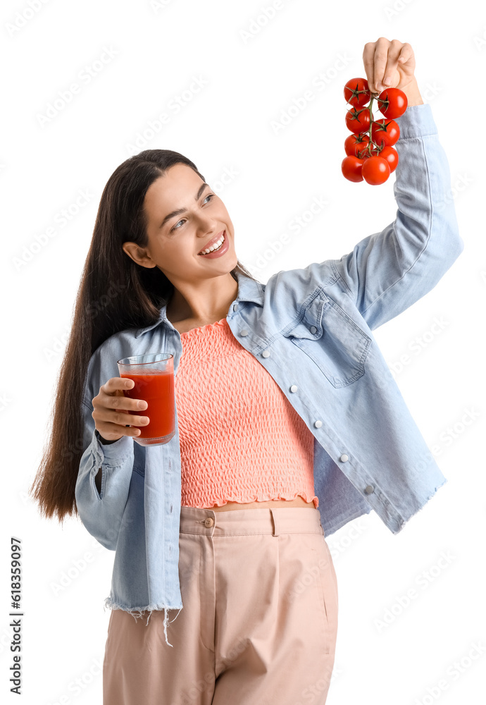 Young woman with glass of vegetable juice and tomatoes on white background