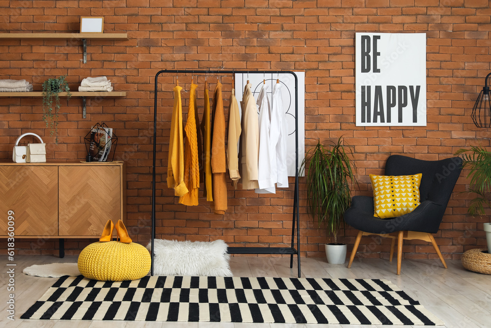 Interior of modern boutique with stylish female clothes and accessories