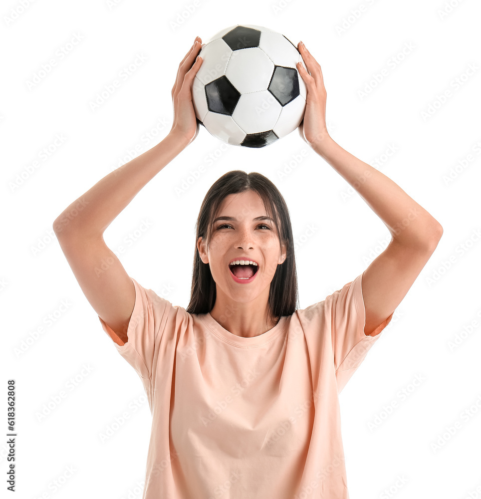 Happy young woman with soccer ball on white background