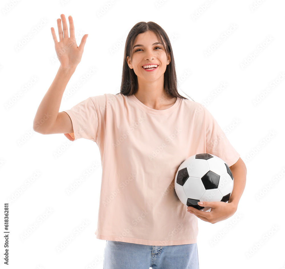 Young woman with soccer ball on white background