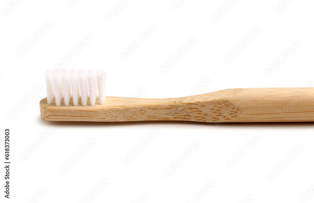 Bamboo tooth brush on white background, closeup