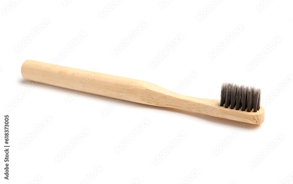 Bamboo tooth brush on white background