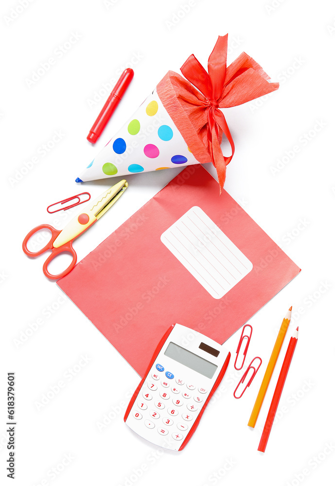 Red school cone with different stationery isolated on white background