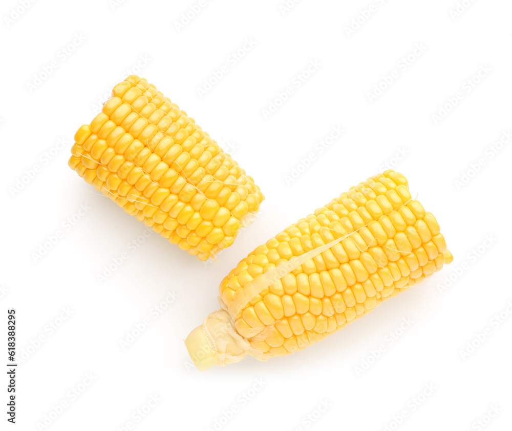 Cut fresh corn cobs on white background