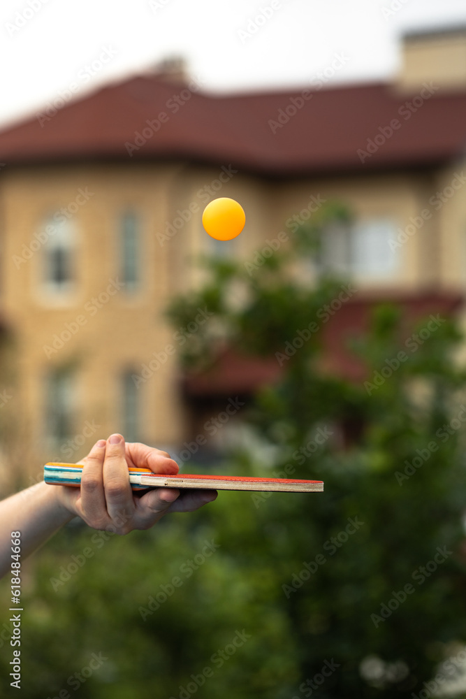 table tennis player doing a serve, close-up, The concept of sport and healthy lifestyle.