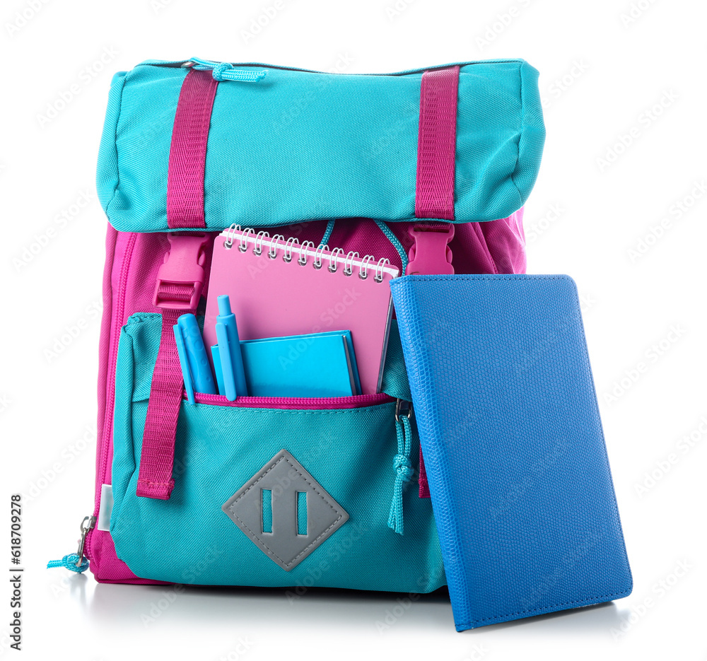 Color school backpack with notebooks and pens on white background