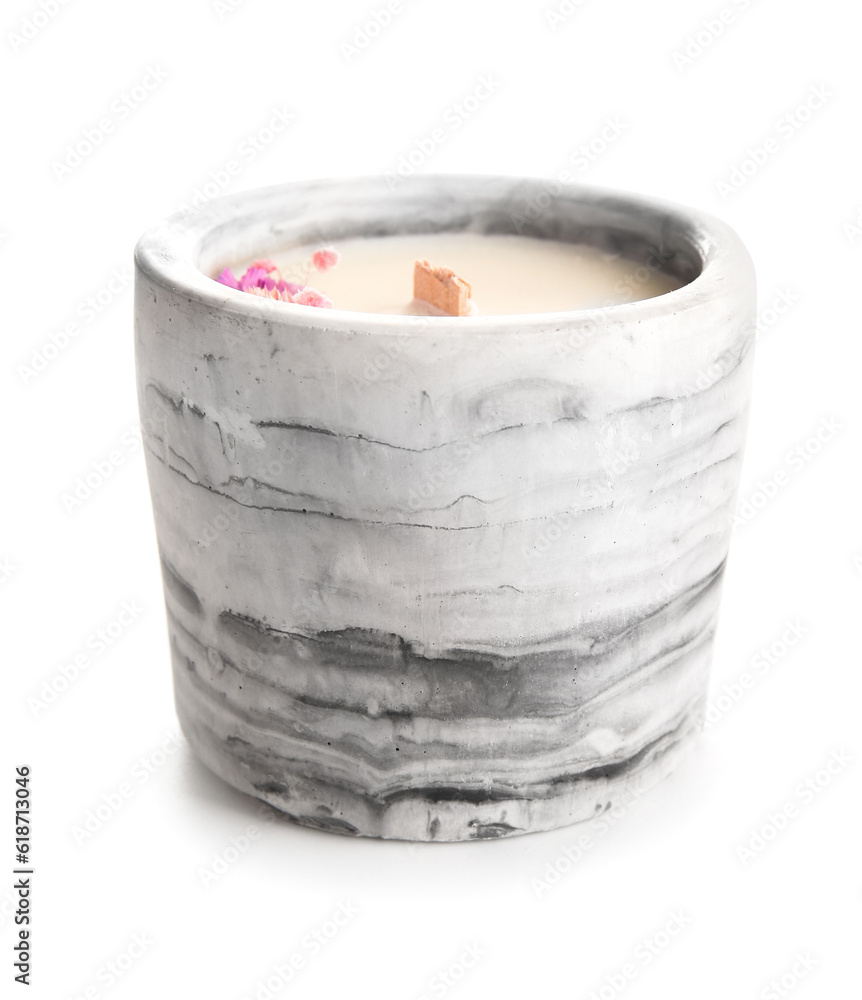 Holder with candle on white background