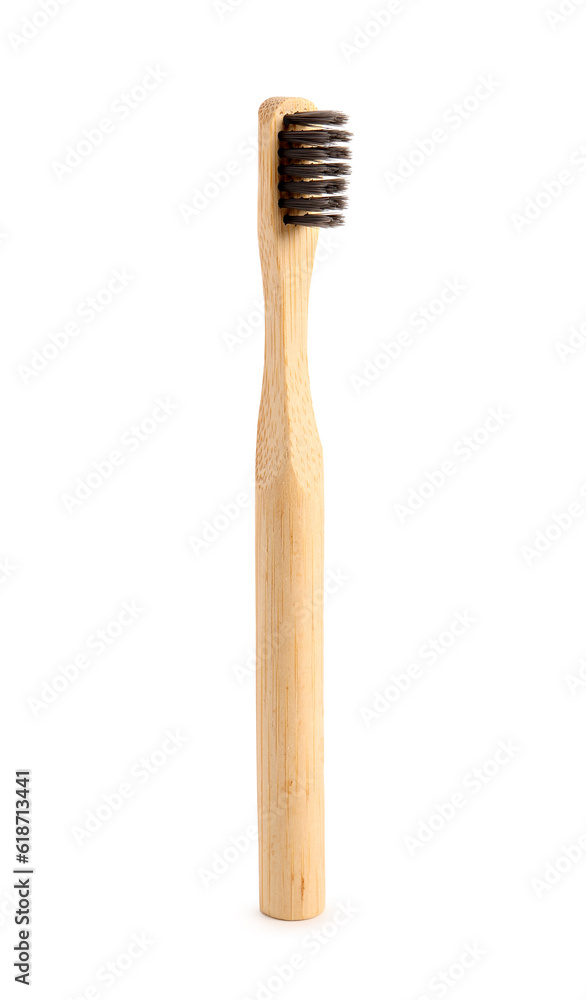 Bamboo tooth brush on white background