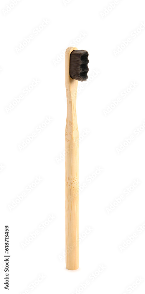 Bamboo tooth brush on white background