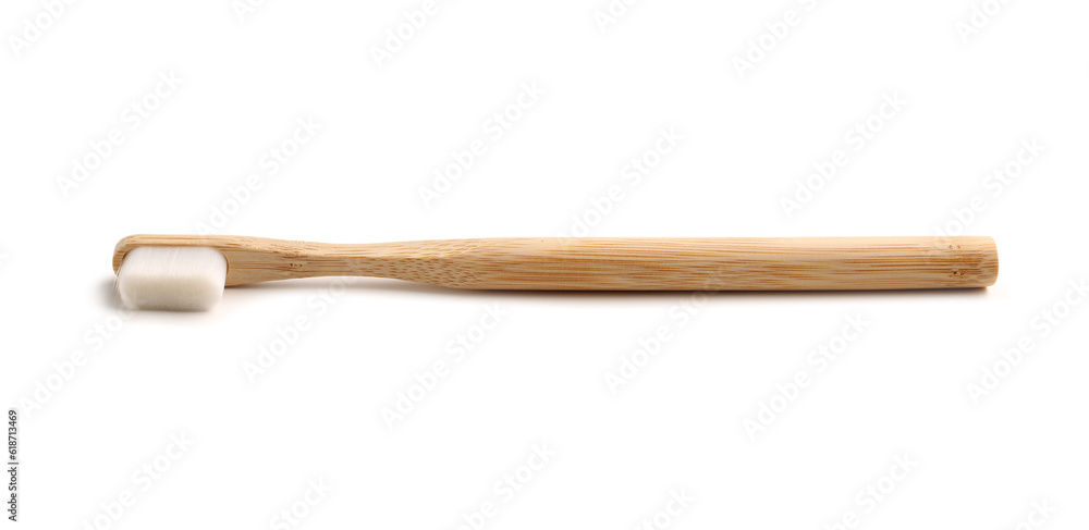 Bamboo tooth brush on white background