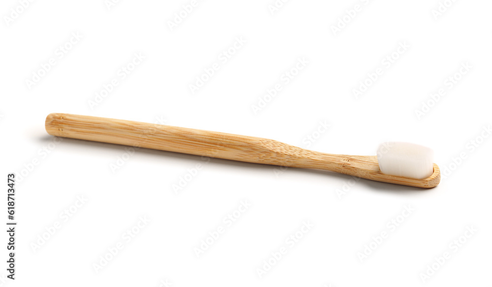 Bamboo tooth brush on white background