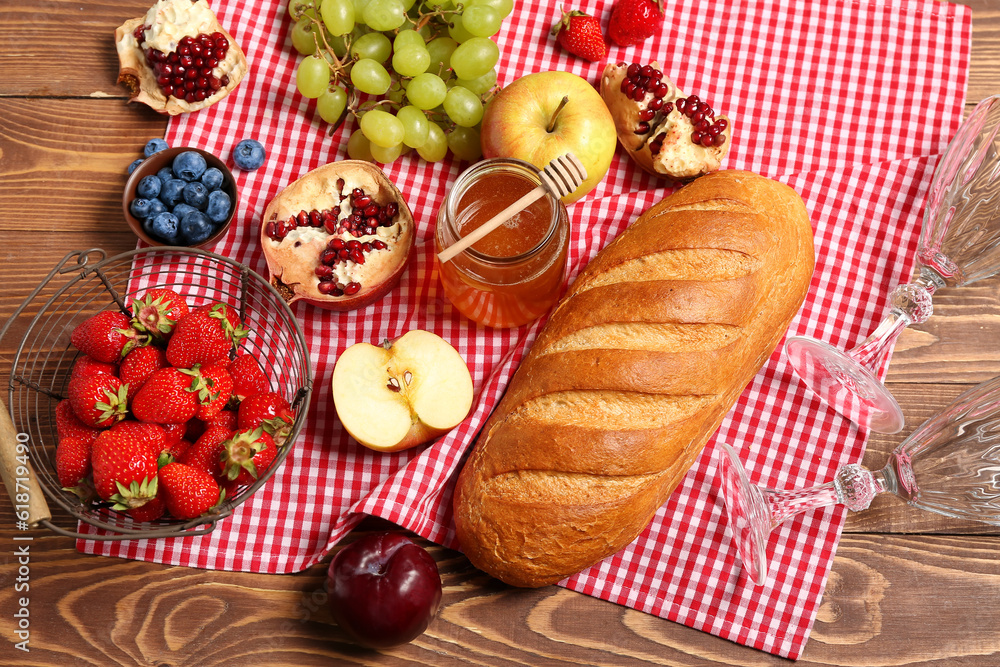 Composition with tasty food for picnic on wooden background