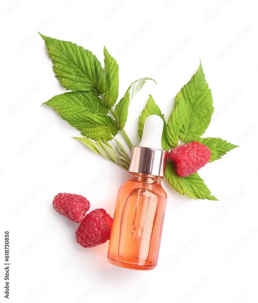 Bottle of cosmetic raspberry oil on white background