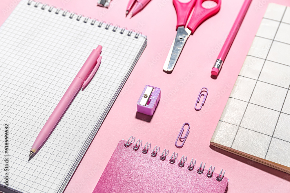 Set of different school stationery on pink background, closeup