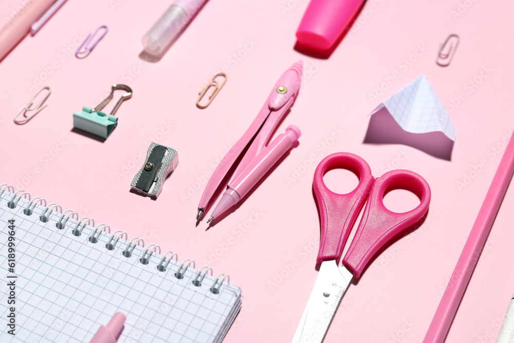 Set of different school stationery on pink background, closeup