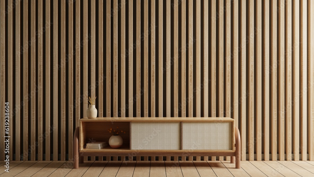 Muji style of living room with cabinet for tv on wooden slat background.