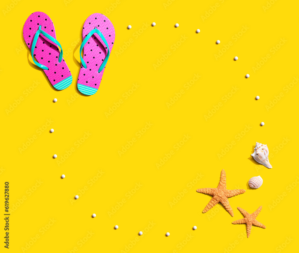 Summer concept with flip flops and starfish - flat lay